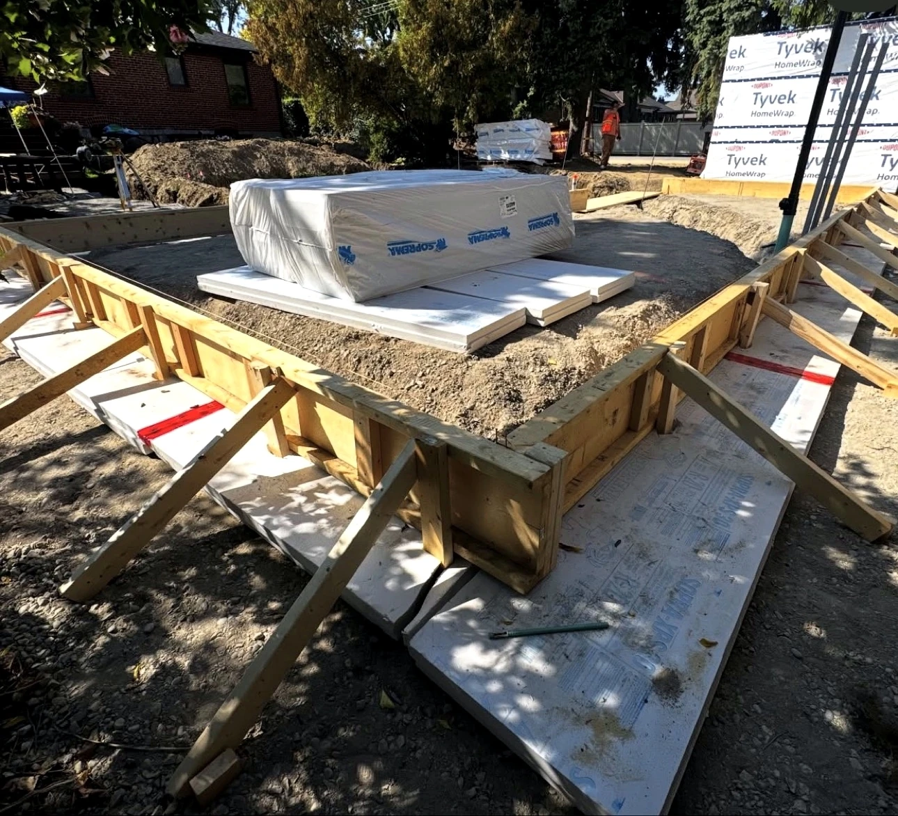 Real Pisces jobsite: foundation formwork corner with staged insulation boards